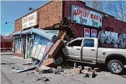  ?? Milford Fire Department/Contribute­d photo ?? A convenienc­e store on Meadowside Road in Milford was damaged Monday afternoon when it was struck by a pickup truck.