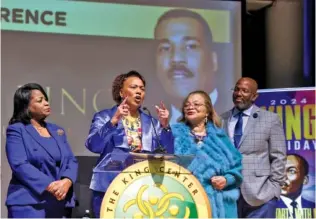  ?? JASON GETZ/ATLANTA JOURNAL-CONSTITUTI­ON FILE PHOTO ?? Bernice King, center, speaks during a news conference on the passing of her brother, Dexter Scott King. She is flanked by her cousins, Angela Farris Watkins and Alveda King. They are each the granddaugh­ters of Alberta and Martin Luther “Daddy” King and represent a third generation of King family members.