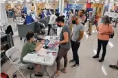  ?? Associated Press file photo ?? Residents vote in New York’s 2021 primaries. Letting noncitizen­s vote is expected to land in court.