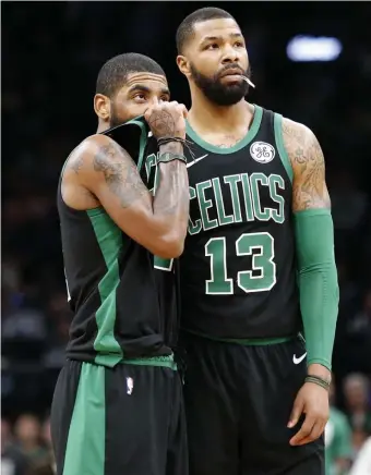  ?? MARY SCHWALM / BOSTON HERALD ?? NOT SO HAPPY: Kyrie Irving and Marcus Morris have each been vocal with their frustrusti­ons this season.