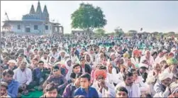  ??  ?? Members of the Gujjar community stage a sit-in at the rail tracks in Rajasthan’s Swai Madhopur on Friday.PTI