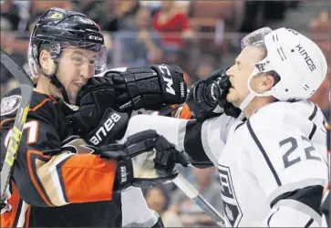  ?? Alex Gallardo
Associated Press ?? DUCKS left wing Nick Ritchie, left, and Kings center Trevor Lewis exchange blows in the second period.