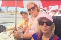  ?? SUBMITTED PHOTO ?? Allison Parrill (right) and her parents Gord and Pauline of Pasadena wait at the airport last Sunday. They were turned away by local authoritie­s and unable to board the Sunwing flight on the day this picture was taken. They were also refused evacuation...