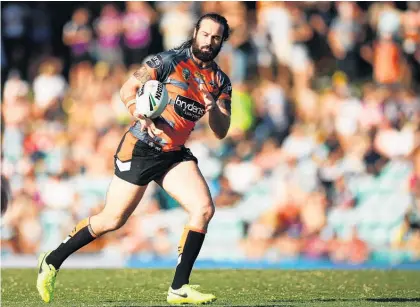  ?? Picture / Getty Images ?? Wests Tigers prop Aaron Woods is unlikely to be moving to Mt Smart.
