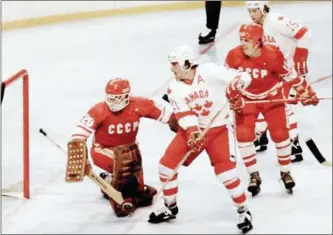  ?? Contribute­d ?? Canada’s Kevin Primeau (21) stands on the doorstep of the famed Vladislav Tretiak at the 1980 Winter Olympics in Lake Placid, N.Y.