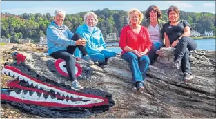  ??  ?? Gin entreprene­urs Bronwyn Jenkins-deas, Juli Dempsey, Lynda Gill, Philippa Dalton and Jenine Ward at the island’s landmark Crocodile Rock