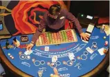  ?? WAYNE PARRY / AP ?? The American Gaming Associatio­n said Wednesday that America’s commercial casinos had their best month ever in March 2022, winning $5.3 billion from gamblers.