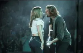  ?? CLAY ENOS — WARNER BROS. PICTURES VIA AP ?? This image released by Warner Bros. Pictures shows Lady Gaga, left, and Bradley Cooper in a scene from “A Star is Born.”