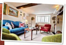  ?? ?? ELEGANT: The living room at Eastbury Cottage. Left: The hotel and, far left, a canine guest relaxing