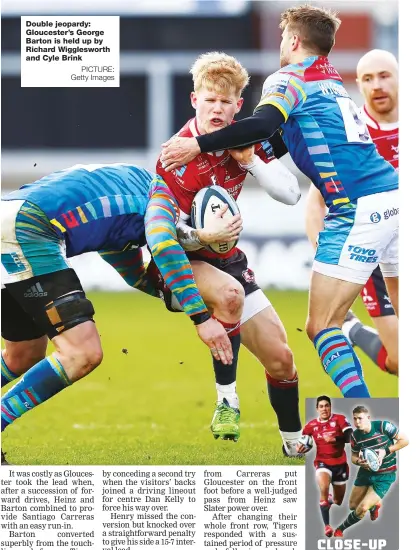  ?? PICTURE: Getty Images ?? Double jeopardy: Gloucester’s George Barton is held up by Richard Wiggleswor­th and Cyle Brink