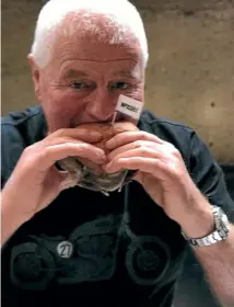  ??  ?? Beef + Lamb New Zealand chief executive Rod Slater tucks into an Impossible Burger.