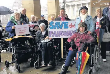  ??  ?? &gt; Campaigner­s had a long wait outside the Council House in their battle to save the Fairways Centre