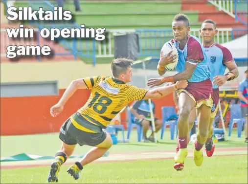  ?? Picture: REINAL CHAND ?? Kaiviti Silktails’ Ratu Timoci Namotukula beats Windsor Wolves’ Isaac Thompson during their match at Churchill Park in Lautoka.