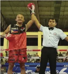  ?? MANNY VILLARUEL ?? OPBF Yough light flyweight titleholde­r John Paul “Angas ng Cebu” Gabunilas celebrates after scoring an eighth round TKO win over the tough Ruben Dadivas of Manny Pacquiao’s MP Stable.