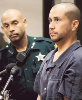  ?? Gary W. Green
Associated Press ?? GEORGE ZIMMERMAN, right, at an April hearing, failed to disclose $200,000 raised from a website his family set up to solicit contributi­ons for his defense.