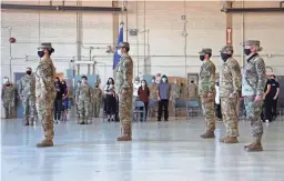  ?? PHOTOS BY DRAKE PRESTO/THE REPUBLIC ?? The C-12 Fixed Wing Detachment stands at attention before being dismissed from the ceremony Friday.