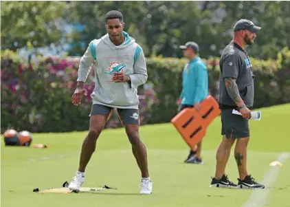  ?? SUSAN STOCKER/SOUTH FLORIDA SUN SENTINEL ?? Dolphins cornerback Byron Jones, pictured rehabbing on June 2 at the team’s training facility in Miami Gardens, tweeted Saturday about why he could never suit up in the 2022 season.