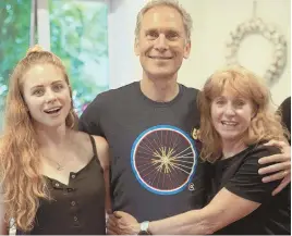  ?? COURTESY PHOTO ?? FAMILY AFFAIR: Olympians Pete (center) and Christine Pfitzinger helped fuel daughter Annika’s (left) passion for running.