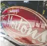Tim Hortons a bright spot for parent RBI as sales slow in Q3 - PressReader
