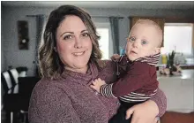  ?? JESSICA NYZNIK EXAMINER ?? Meghan Van de Bor and her son Radson pose for a photo at their home in Omemee, Ont. on Thursday. Radson was born at 26 weeks gestation, weighing under 2 pounds. World Prematurit­y Day is Sunday.