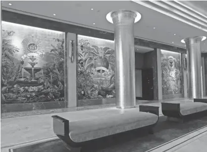  ?? PHOTOS BY LYNNE SLADKY/AP ?? Gilded columns line the lobby of the Faena Hotel in Miami Beach, Fla., adorned with murals by Argentinia­n painter Juan Gatti.