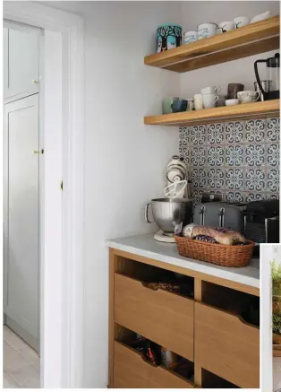  ?? ?? A built-in larder was created by the kitchen company, cleverly making use of some extra space. It’s the perfect area for Jenny’s counter-top appliances, helping the kitchen to stay clutter free