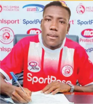  ??  ?? SHORT- LIVED ROMANCE . . . Zimbabwe internatio­nal defender,Peter Muduhwa, seen here signing his deal at Tanzanian giants, Simba SC, in January, is frustrated to be heading home without kicking a ball for them