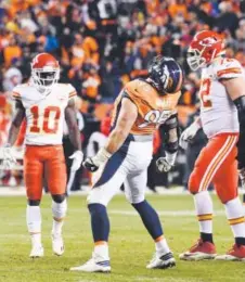  ??  ?? Broncos defensive end Derek Wolfe howls to the sky after sacking Chiefs quarterbac­k Alex Smith on Nov. 27. John Leyba, The Denver Post