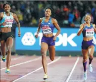  ?? LUCY NICHOLSON / REUTERS ?? Phyllis Francis of the US wins the 400m final ahead of compatriot Allyson Felix and Shaunae Miller-Uibo of Bahamas at London Stadium on Wednesday.