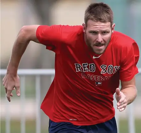  ?? MATT STONE / HERALD STAFF FILE ?? CLOSER TO A RETURN: Chris Sale threw 15 pitches in a simulated game on Sunday to Red Sox minor leaguers.