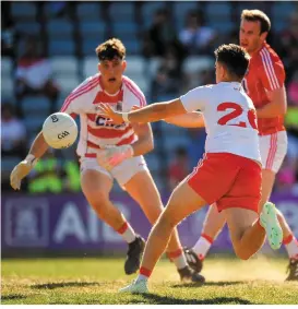  ?? BRENDAN MORAN/SPORTSFILE ?? Cork goalkeeper Mark White can only look on as Ronan O’Neill palms the ball home for Tyrone’s second goal in Portlaoise