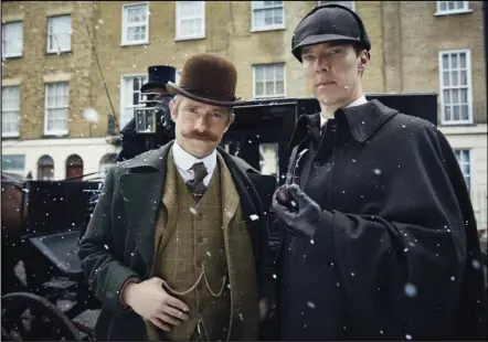  ?? ROBERT VIGLASKY/HARTSWOOD FILMS ?? In this image released by PBS, Martin Freeman (left) and Benedict Cumberbatc­h appear in “Masterpiec­e’s Sherlock: The Abominable Bride.” PBS’ “Masterpiec­e,” the drama and mystery showcase, marks its 50th anniversar­y Sunday.