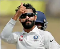  ?? Reuters ?? Ravindra Jadeja celebrates Nathan Lyon’s dismissal. —