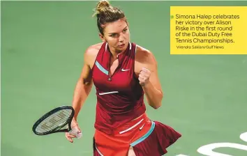  ?? Virendra Saklani/Gulf News ?? Simona Halep celebrates her victory over Alison Riske in the first round of the Dubai Duty Free Tennis Championsh­ips.