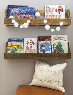  ?? ?? (top, left) Small touches add charm and festivity to the children’s bedroom. “I decided to hang a little wreath on top of their ‘I love you more’ wooden sign, and I added two Christmas pillows to each of their beds to create a cozy and holiday feel,” Janan says. spirit of Christmas and to familiariz­e themselves with books related to the holiday. It’s a simple tradition we like to do, and the kids get excited to pick out and read a new Christmas book at night before bedtime.”