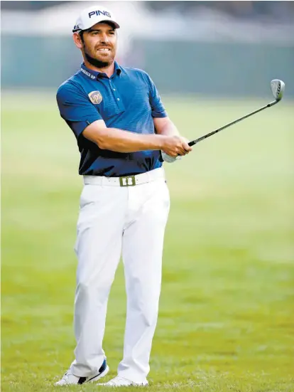  ??  ?? El sudafrican­o Louis Oosthuizen durante uno de sus golpes en el torneo