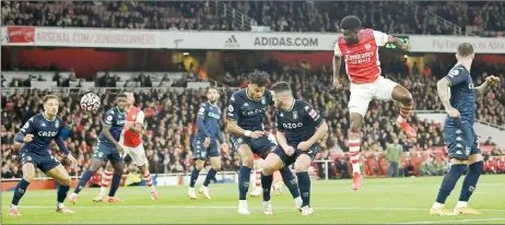  ?? — AFP photo ?? Arsenal’s Thomas Partey (second right) scores during the English Premier League match against Aston Villa at the Emirates Stadium in London.