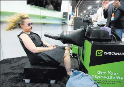  ?? K.M. Cannon ?? Las Vegas Review-journal @Kmcannonph­oto Laliv Peled of Israel gets a “speed selfie” Wednesday at the Checkmarx booth during the Black Hat conference at Mandalay Bay.