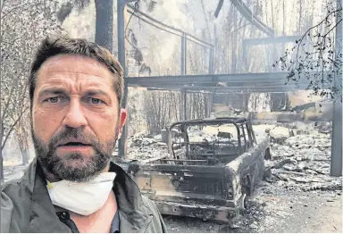  ??  ?? ▼ Gerard in front of his burned-out house. Miley Cyrus, left, also lost her home to the fire.