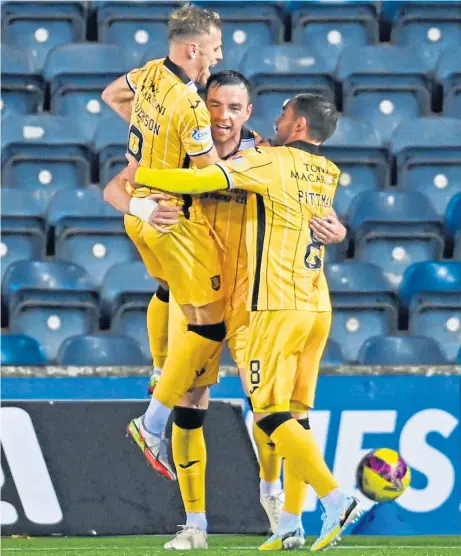  ?? ?? Sean Kelly takes the plaudits after converting his penalty against Kilmarnock