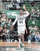  ?? CARLOS OSORIO/AP ?? Michigan State forward Gabe Brown reacts after a 3-point basket against Nebraska Wednesday in East Lansing, Mich.