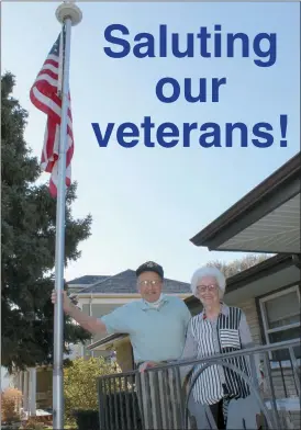  ?? Mona Weatherly ?? Above, Army veteran Wayne Mills, left, stands with his wife, Marvel, next to the flagpole in their front yard. One of the last World War II veterans locally, Mills helps others purchase flag poles for their own yards.