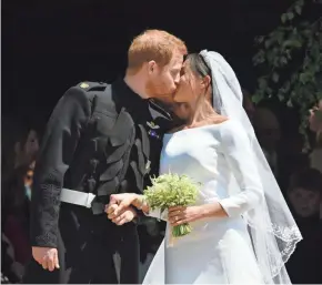  ?? ASSOCIATED PRESS ?? Britain’s Prince Harry and Meghan Markle leave after their wedding ceremony at St. George’s Chapel in Windsor Castle, in Windsor, England, on May 19. A new study shows lower rates of divorce among the young in the U.S., with younger women driving the trend.