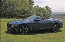  ?? MARC GRASSO/MEDIANEWS GROUP ?? The Bentley Continenta­l GT convertibl­e is a V-126.0-liter sports car with 626 horsepower that can drop the top in 19 seconds, while driving, and our tester came with $45,000in options, just saying.