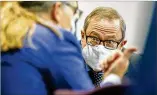  ?? ?? Greg Mcmichael listens to his attorney, Franklin Hogue, during the sentencing procedure Friday in the Glynn County Courthouse.