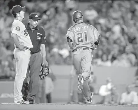  ?? Photograph­s by Allen J. Schaben Los Angeles Times ?? KENTA MAEDA can only stare in disbelief as he opened the third inning by walking Diamondbac­ks pitcher Zack Greinke and then allowed Greinke to score on a wild pitch. Maeda hadn’t started a game in two weeks and he failed to deliver Friday.