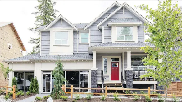  ??  ?? Homes at Fern Grove have welcoming front porches, pitched roofs and natural stone accents. The houses are offered with both finished and unfinished basement suite areas.