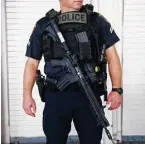  ??  ?? HPD airport security officials say they want to match the firepower of any wouldbe assailant, hence the officer armed with an AR-15, an extra clip and a pistol.