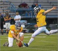  ??  ?? CR North’s Max Pedinoff gets everything into field goal attempt.