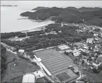  ?? REUTERS ?? The multipurpo­se sports field used for the Deokjeok High School team’s practice sessions on Deokjeok island.